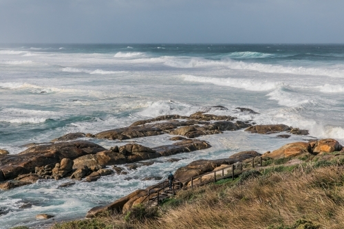 Powerful ocean with coastline and rocks - big waves and swell