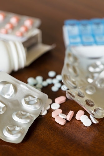 Prescription medications on table - Australian Stock Image