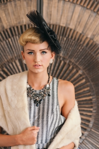 pretty young woman dressed up for race day or a special event - Australian Stock Image