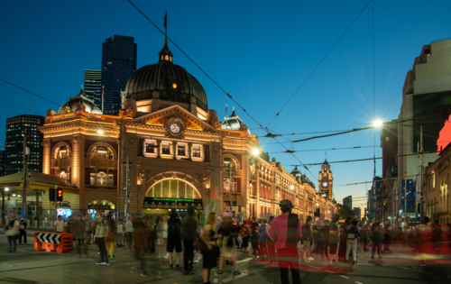 Protest rally in front of Flinders Street Station at night - Australian Stock Image