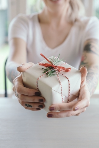 Woman Wrapping Christmas Gifts Overhead Shot Stock Photo