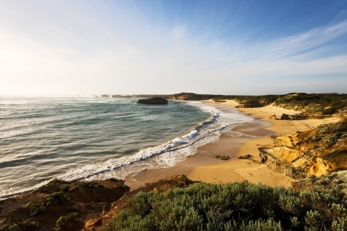 Remote beach with islands in background - Australian Stock Image