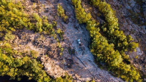 remote camping in dry creek bed - Australian Stock Image