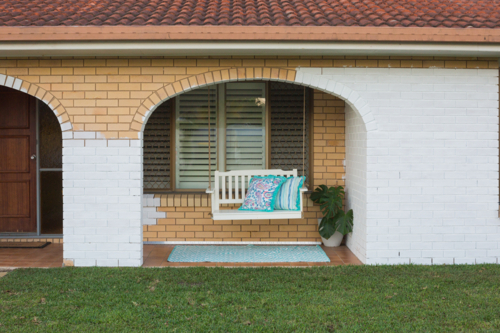 Renovated House Exterior with Porch Swing - Australian Stock Image