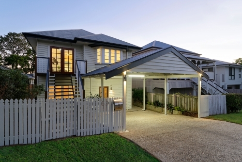 Renovated Queenslander home at twilight - Australian Stock Image