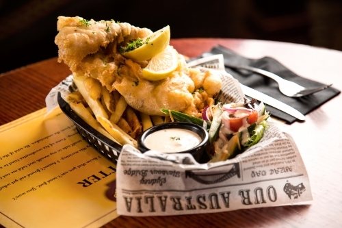 Restaurant meal of fish and chips - Australian Stock Image