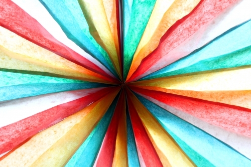 Reverse close up of a colourful paper decoration - Australian Stock Image