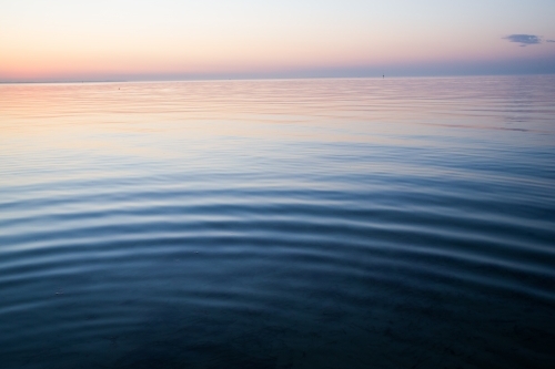 Ripples on the ocean in the evening - Australian Stock Image