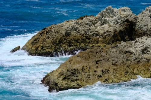 Rocks in the ocean near North Gorge, Straddie - Australian Stock Image