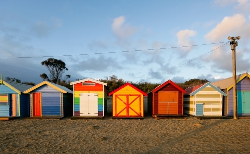 Row of bathing boxes at a city beach - Australian Stock Image