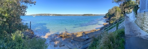 Salmon Haul Bay on the Hacking River with a walking path and access stairs - Australian Stock Image