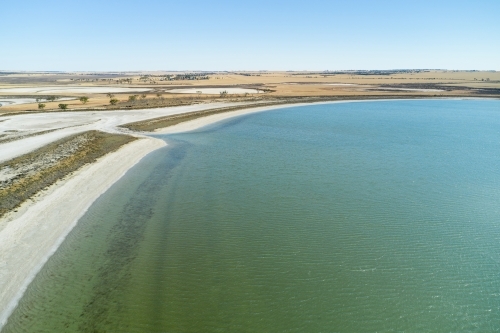 Salt lake in Western Australia, with the water in the lake contrasting with the dry landscape - Australian Stock Image