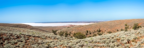 Saltlakes in the distant in arid Australian land. - Australian Stock Image