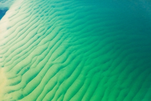 sea channels and shallows with sand ripples - Australian Stock Image