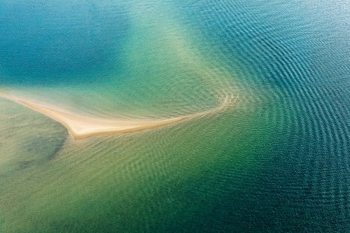 sea channels and shallows with sand ripples - Australian Stock Image
