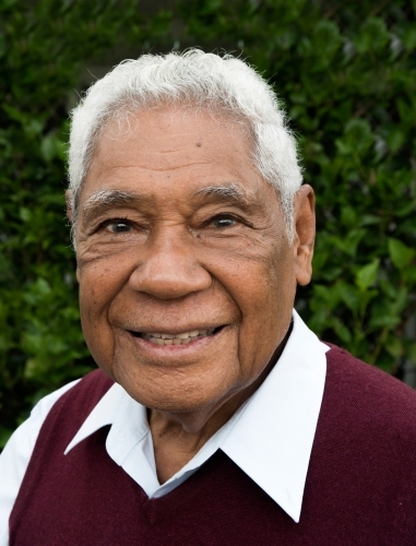 Senior man with Indonesian heritage smiles in profile photo. - Australian Stock Image