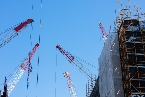 Several cranes operating in the Brisbane CBD - Australian Stock Image