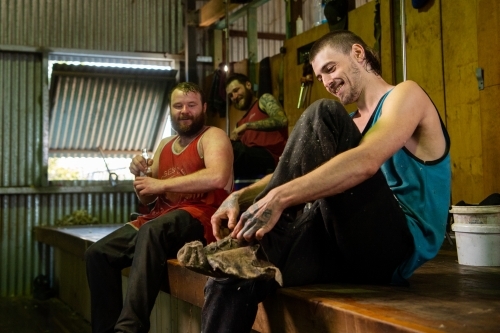 Shearers relax after a day's work - Australian Stock Image