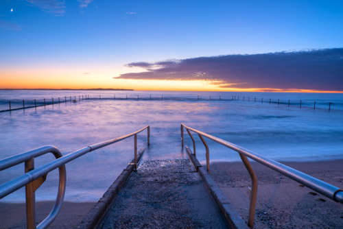 Shelly Park ocean pool at sunrise - Australian Stock Image