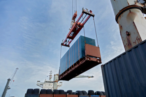 Shipping container being loaded - Australian Stock Image