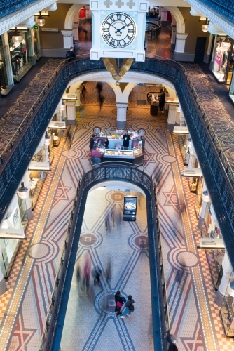 Shoppers blurred as they walk in Queen Victoria Building - Australian Stock Image