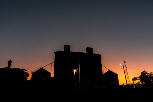 Silos at sunrise with dawn colours - Australian Stock Image