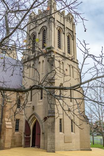 Singleton Catholic Church through tree branches - Australian Stock Image