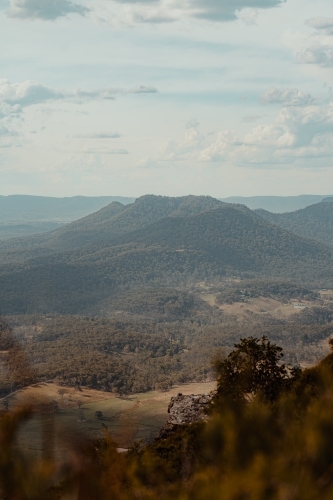 Small mountain covered in trees as seen from Blackheath Lookout - Australian Stock Image