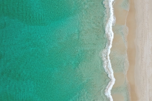 Small wave on a Perth beach in summer - Australian Stock Image