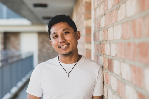 smiling portrait of asian man - Australian Stock Image