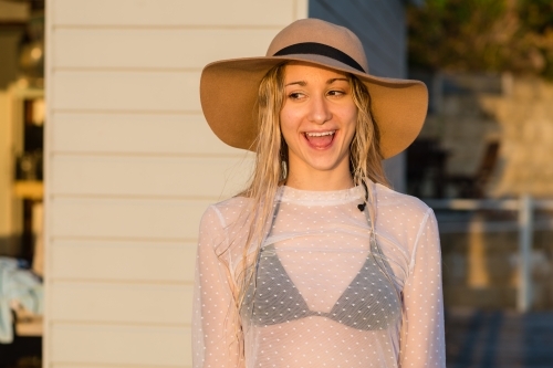 smiling woman wearing hat - Australian Stock Image