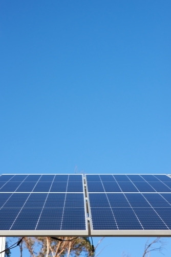 Solar panels against clear blue sky - Australian Stock Image