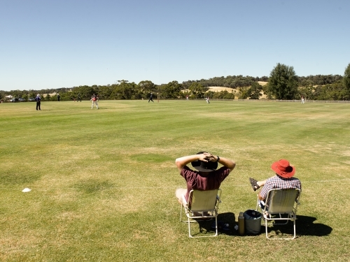 Spectators at a T20 cricket match in the country