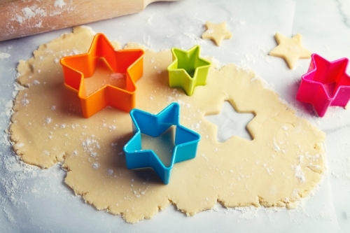 Star shaped cookie dough and rolling pin