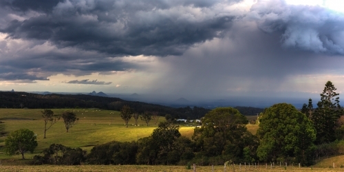 Storm over Glasshouse Mountains - Australian Stock Image