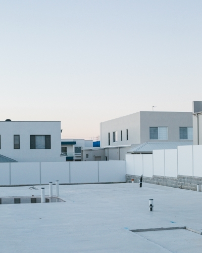 Suburban housing construction site and building foundations, evening light - Australian Stock Image