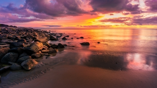 Sunrise over Four Mile Beach Port Douglas - Australian Stock Image