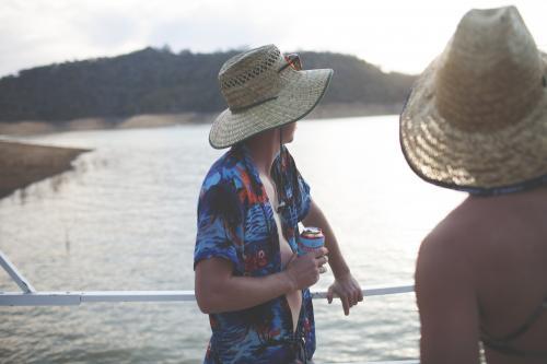 Sunset at Lake Eildon with Tropics themed dress up - Australian Stock Image