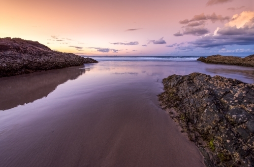 Sunset over calm water - Australian Stock Image