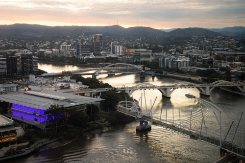 Sunset over the Brisbane River looking towards Mt Coot-tha at dusk - Australian Stock Image