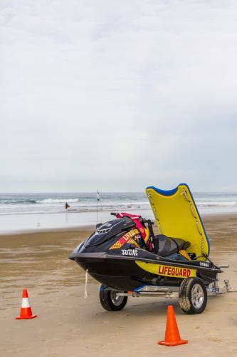 Surf Life Saving jet ski on beach - Australian Stock Image