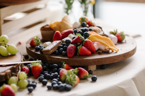 Sweet food platter on kitchen table - Australian Stock Image