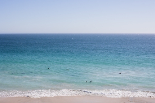 swimmers at remote beach - Australian Stock Image