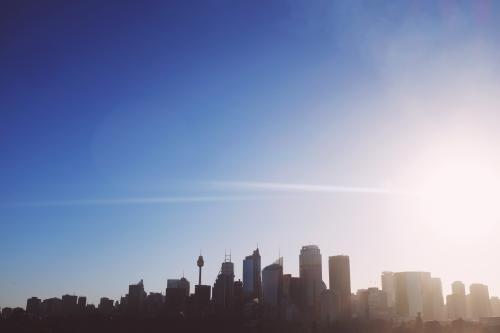 Sydney skyline with sun flare - Australian Stock Image