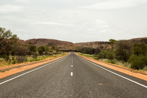 Symmetrical view of rural road - Australian Stock Image