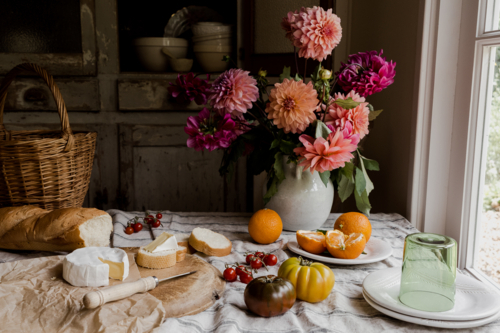 tablescape of a cheese and other picnic foods - Australian Stock Image
