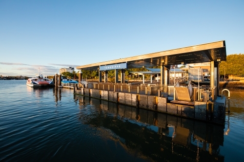 Teneriffe Citycat ferry terminal on the Brisbane River in the morning - Australian Stock Image