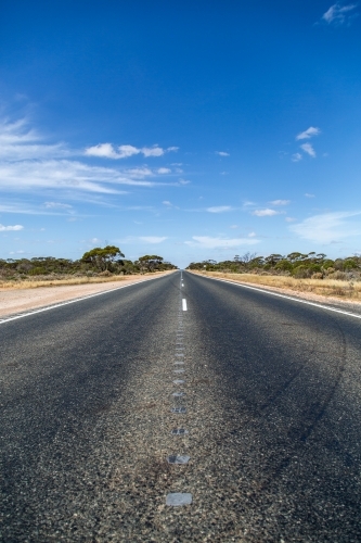 The beginning of the 90 Mile Straight on the Eyre Highway on the Nullarbor - Australian Stock Image