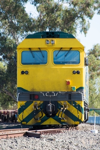 The face of a yellow train coming towards the camera - Australian Stock Image