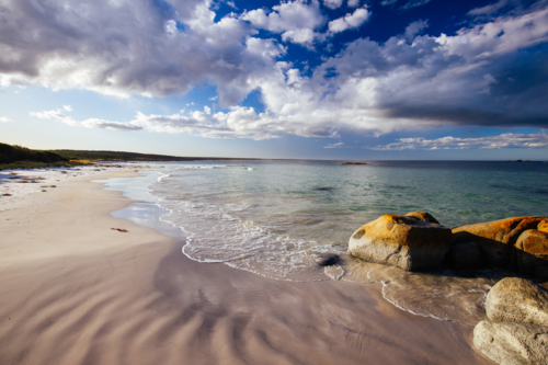 The Gardens Beach at sunset in the Bay of Fires near Binalong Bay, Australia - Australian Stock Image